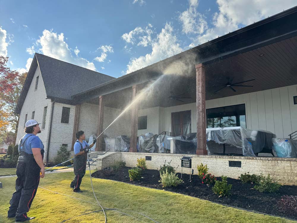 Firewater power washing a commercial building exterior
